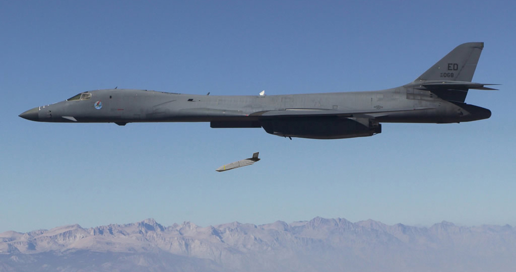 image of plane dropping missile